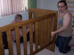 Assembling baby's cot